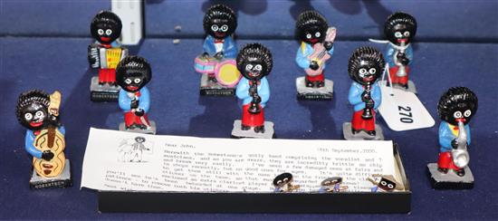 A Robertsons Golly Band and various Golly badges